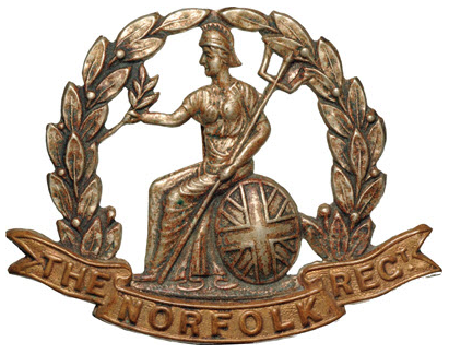  Photo of Royal Norfolk Regiment Cap Badge from personal collection. Author: Dormskirk. CC BY-SA 3.0,