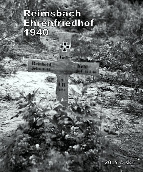 Reimsbach, War cemetery, the viewer is standing during a cold winter day where the landscape of the graveyard is still covered with snow, before the burial grave decorated with flowers and a wooden cross which was engraved name the KEHL Reinhard and the day of his dead ✞ 13.05.1940.