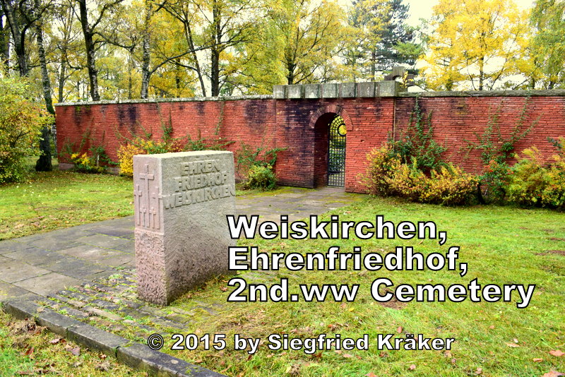 A view during autumn from the street towards the entrance of the War Cemetery in Weiskirchen situated in the northern part of the federal state of Saarland in Germany.